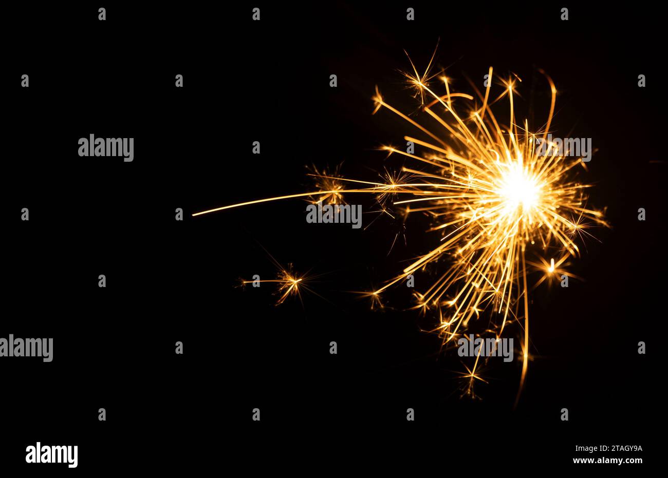 Close-up of sparks from fireworks, decorative lights, and decoration materials for celebrations. Stock Photo