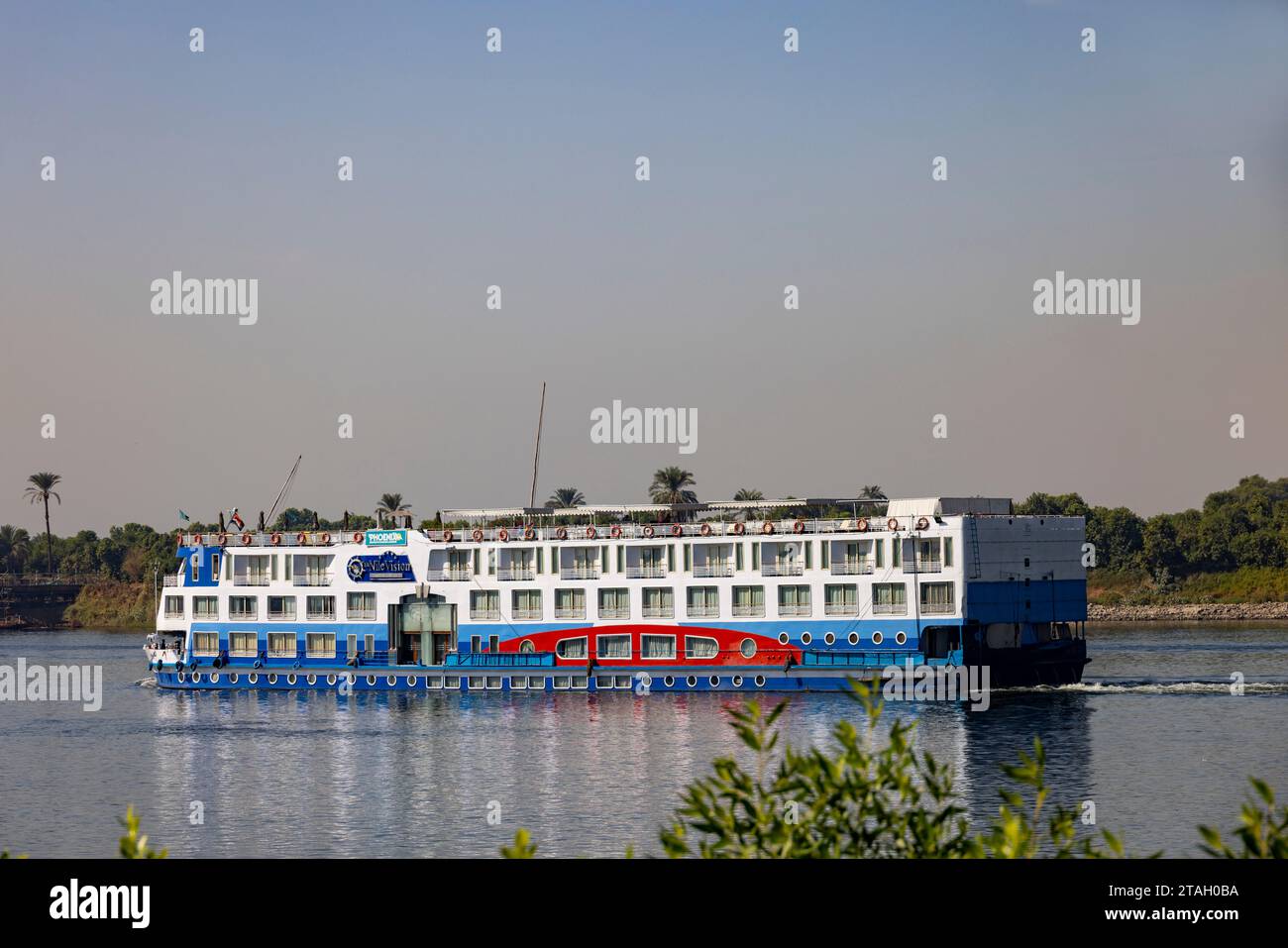 cruise boat sailing on the river Nile south of Luxor town, Egypt Stock ...