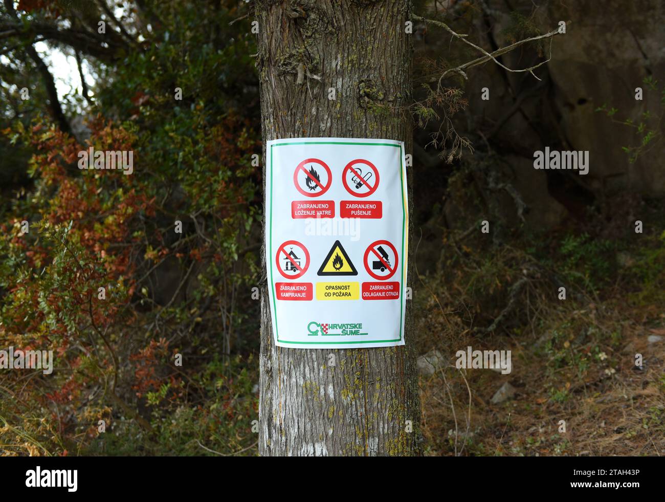 Lastovo, Croatia - August 2017: Signs 'No Fire', 'No Smoking', 'No Camping' in forest on island Lastovo, Croatia. Stock Photo