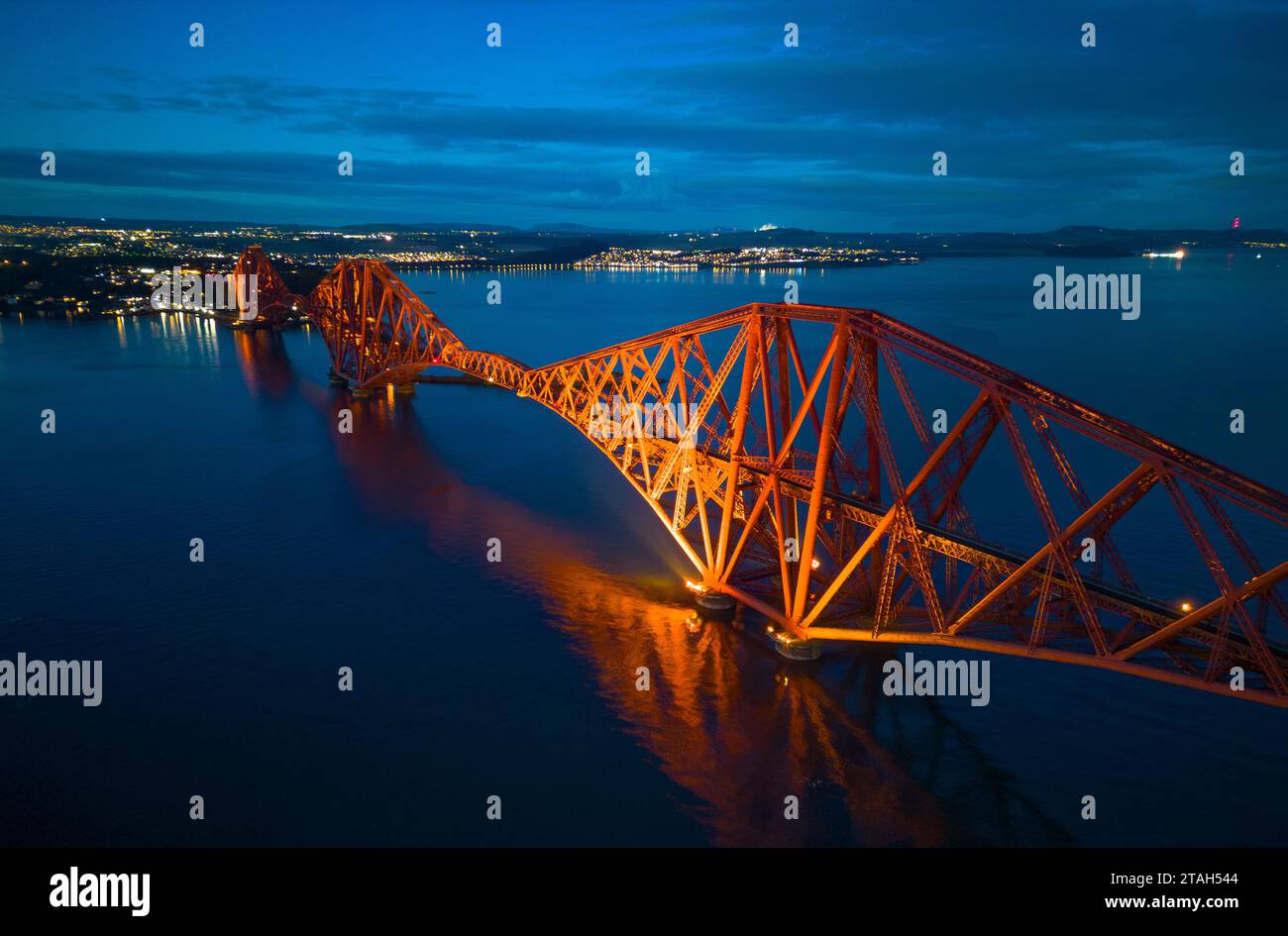 Evening aerial view from drone of the Forth Bridge ( Forth Rail Bridge) a UNESCO World heritage site, crossing the Firth of Forth, at South Queensferr Stock Photo