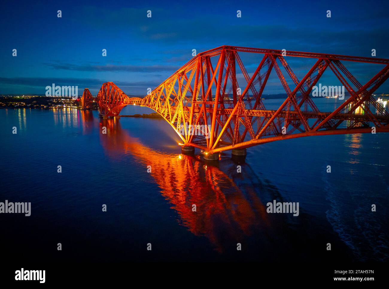 Evening aerial view from drone of the Forth Bridge ( Forth Rail Bridge) a UNESCO World heritage site, crossing the Firth of Forth, at South Queensferr Stock Photo