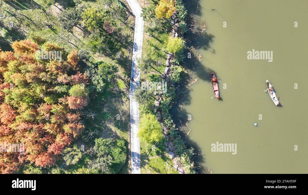 HUZHOU, CHINA - DECEMBER 1, 2023 - River cleaners and volunteers salvage floating objects at Qimei Mountain in Geishan village, Zhongguan Town, Deqing Stock Photo