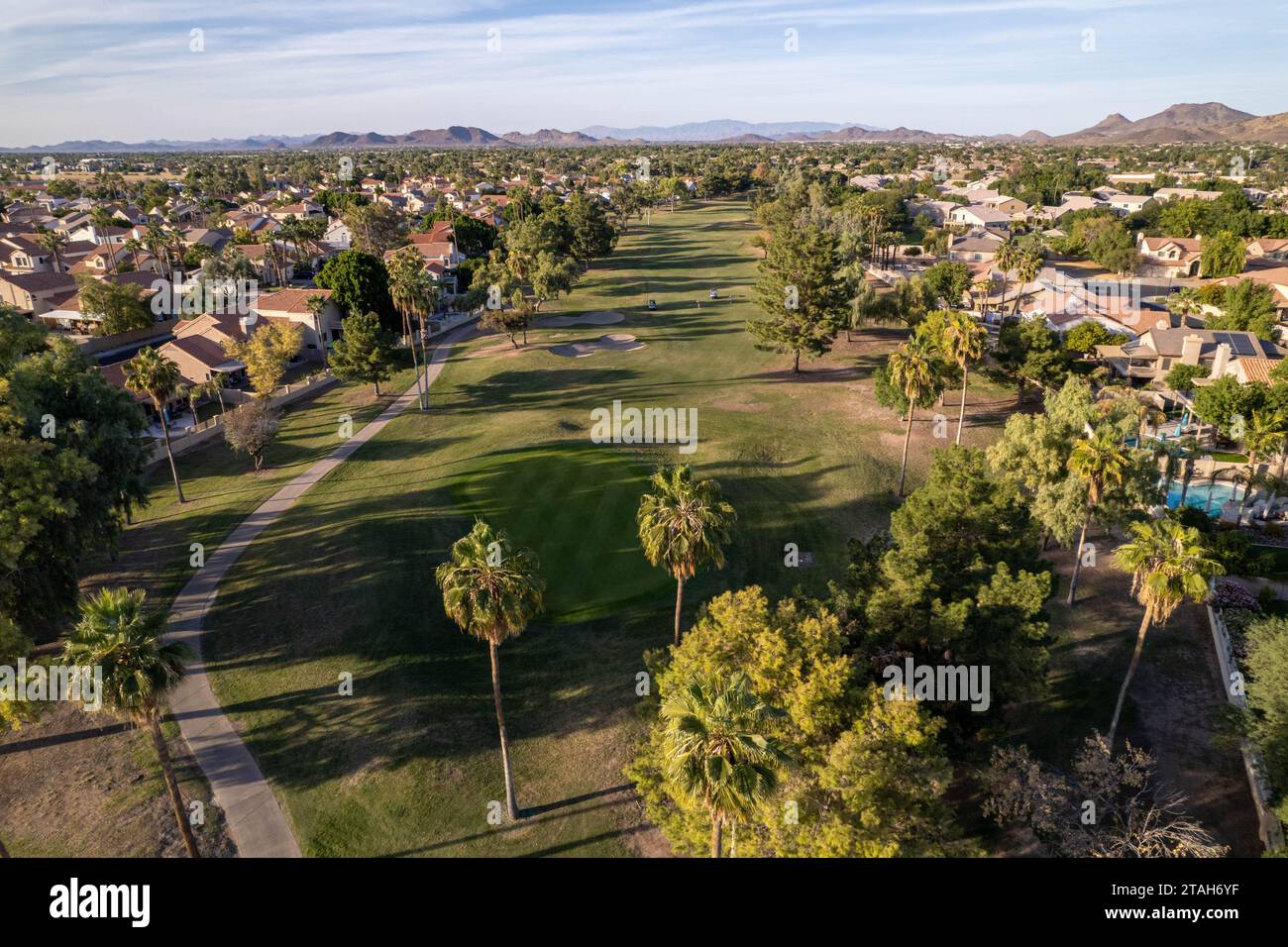A scenic residential area with green trees. Arrowhead Ranch, Glendale