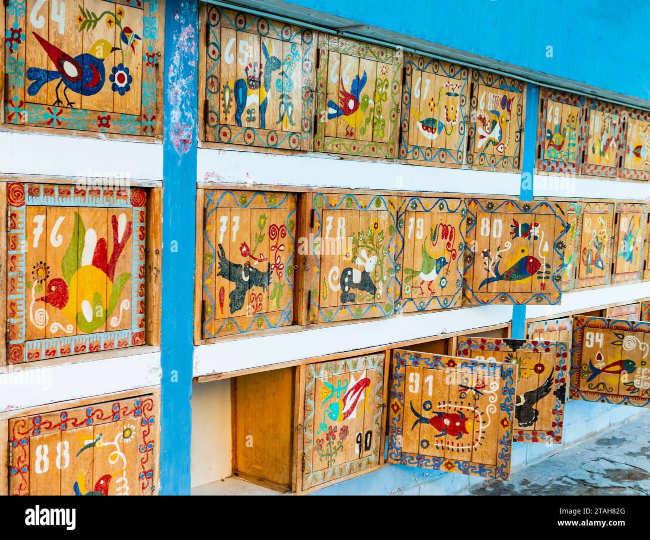 Colorful lockers at La Calera thermal waters, painted with traditional motifs and indigenous animals that populate the valley, Chivay, Peru Stock Photo