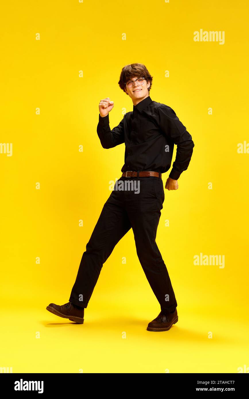 Happy smart casual man walking hi-res stock photography and images - Alamy