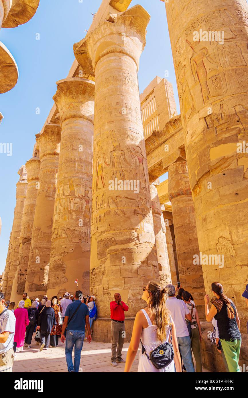 Ancient temple complex of Karnak. Hypostyle hall. Luxor, Egypt – October 21, 2023 Stock Photo