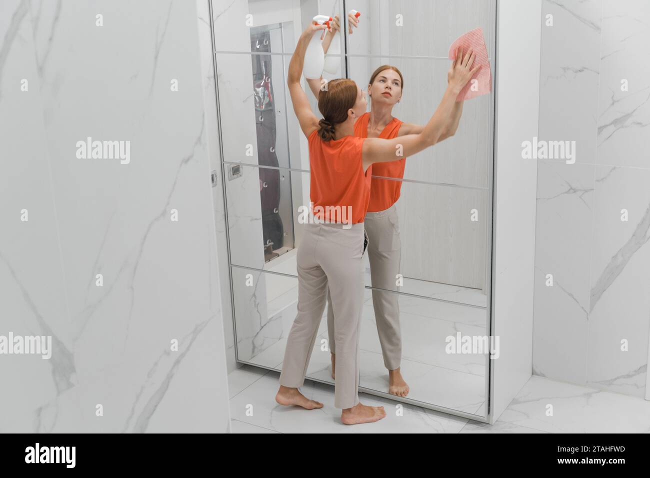 Chinese woman cleaning house hi-res stock photography and images - Alamy