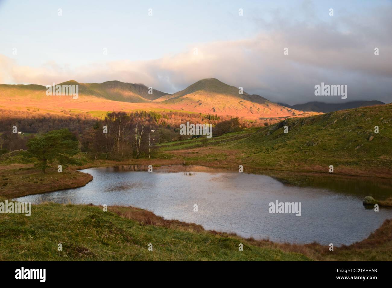 Lake district fells at Kelly hall tarn and old man of coniston Stock Photo