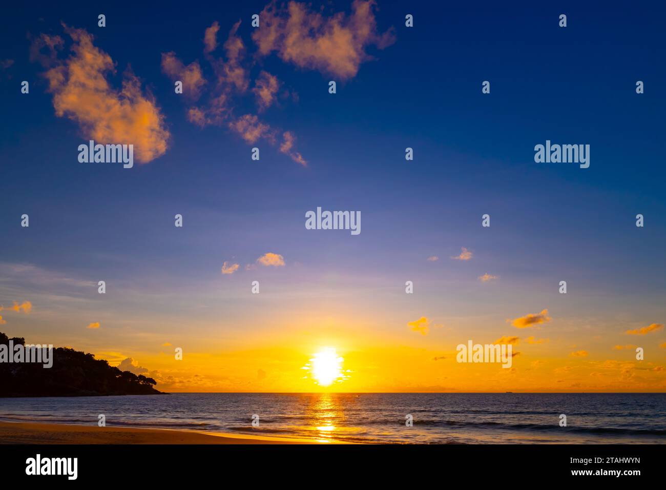 Beautiful colorful sunset or sunrise sky over sea with dramatic clouds ...