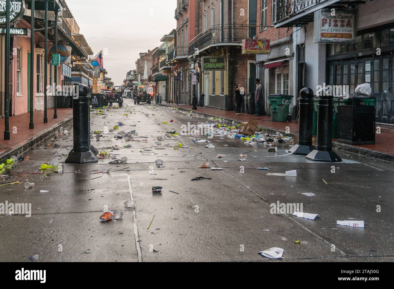 New Orleans, LA, US-January 18, 2023:  Litter from Mardi Gras party on Bourbon Street in the popular French Quarter after a busy weekend evening. Stock Photo