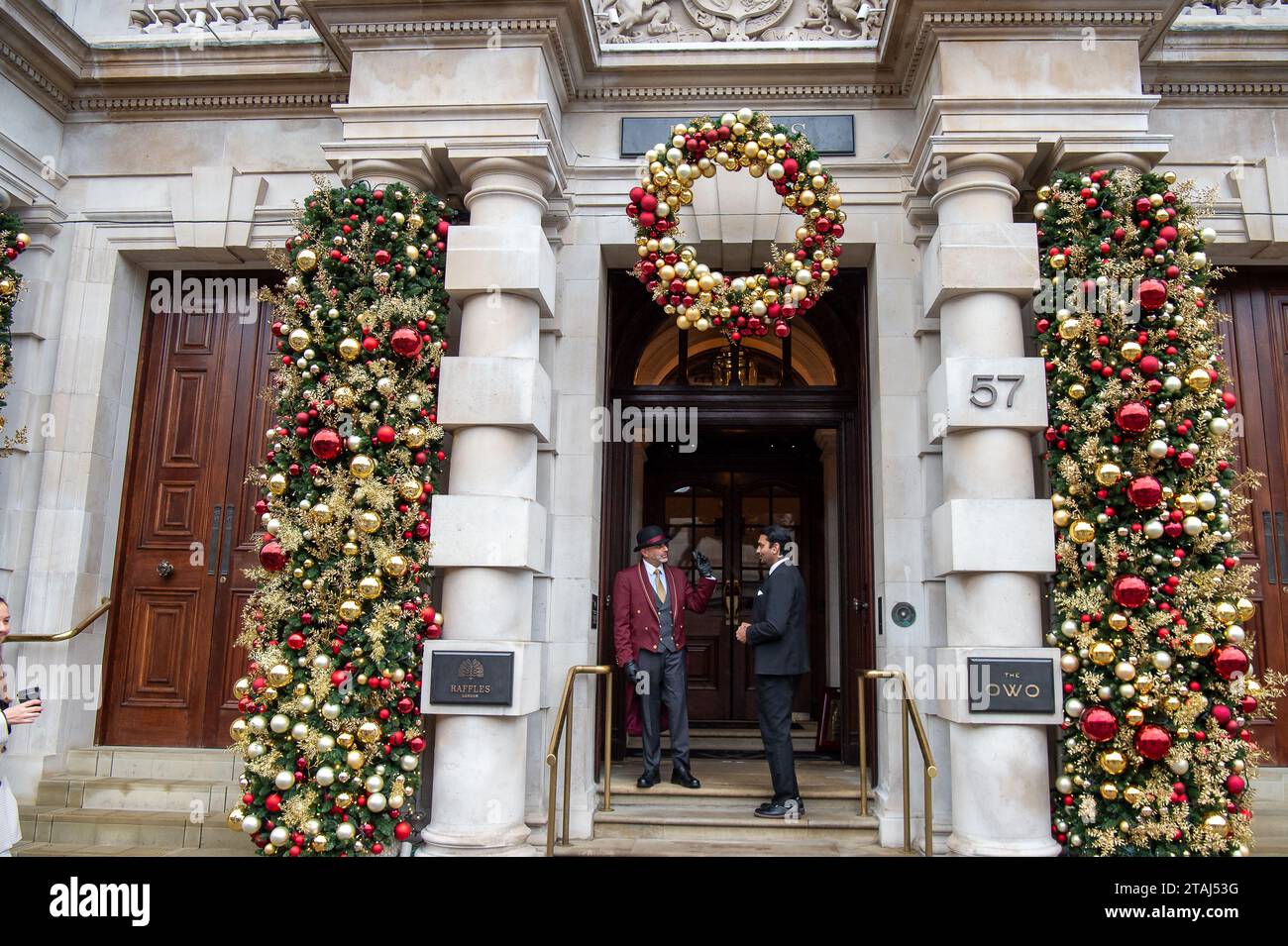 London, UK. 27th November, 2023. Christmas decorations outside the famous Raffles bar and the Owo in Whitehall, London Stock Photo
