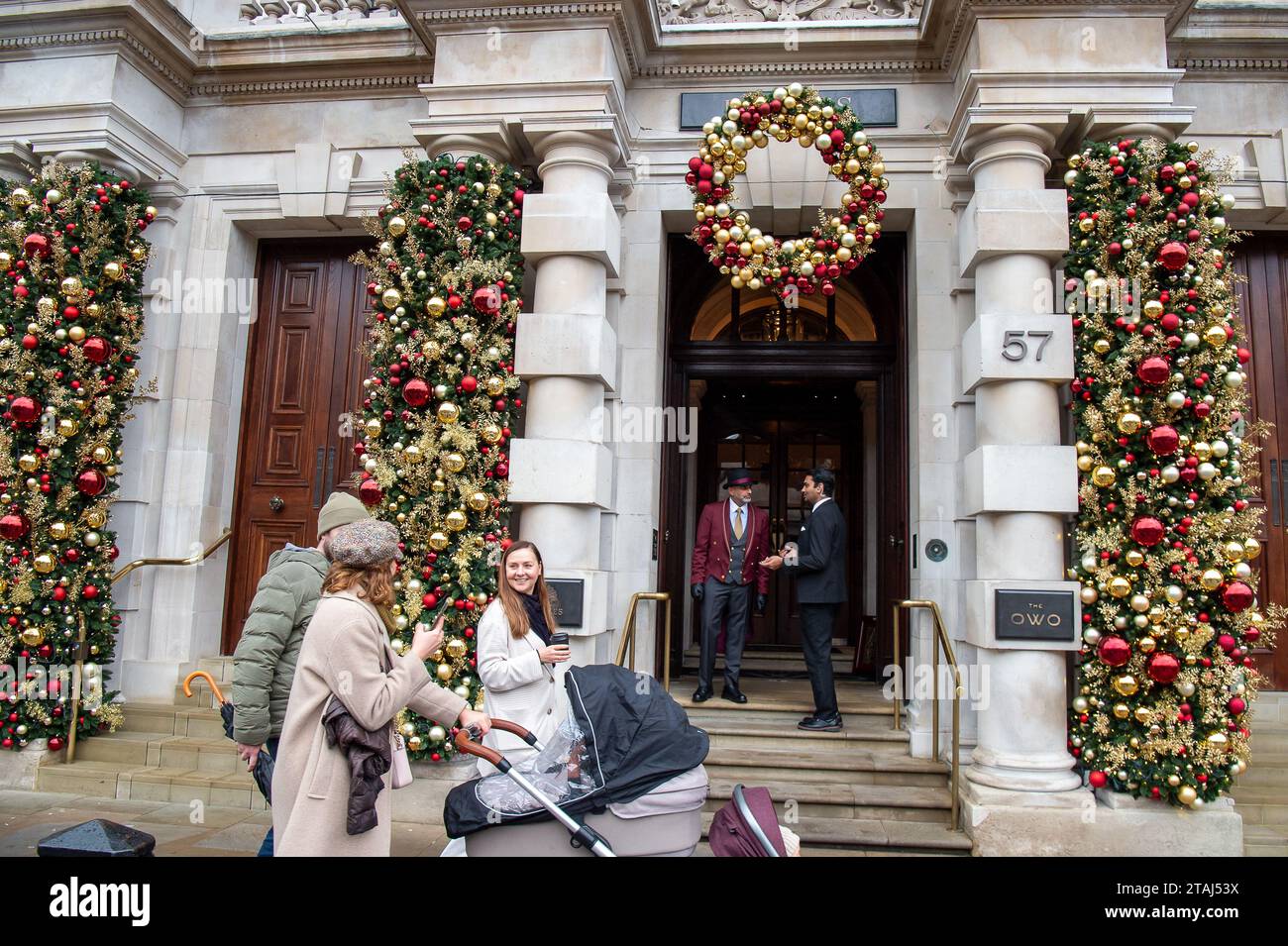 London, UK. 27th November, 2023. Christmas decorations outside the famous Raffles bar and the Owo in Whitehall, London Stock Photo