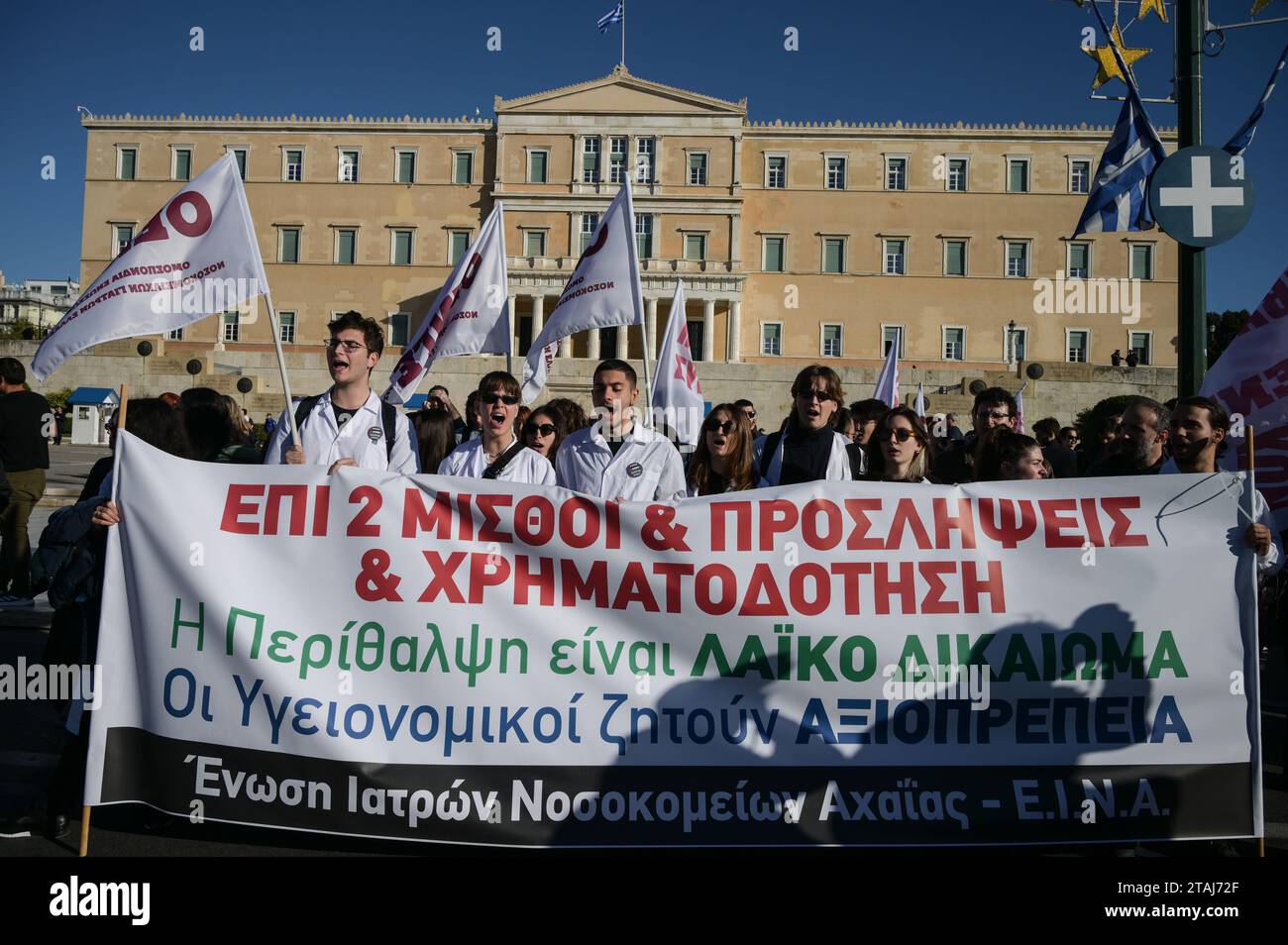 Striking hospital doctors shout slogans during a protest demanding ...