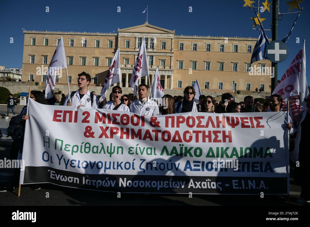 Striking hospital doctors shout slogans during a protest demanding ...