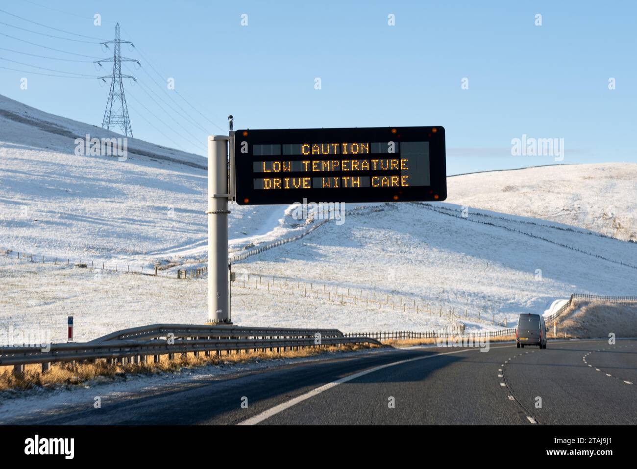 M74 motorway near Abington, South Lanarkshire, Scotland, UK. 1st Dec, 2023. UK weather: Caution Low Temperature Drive with Care variable message sign on the M74 northbound motorway near Abington, South Lanarkshire, Scotland Credit: Kay Roxby/Alamy Live News Stock Photo