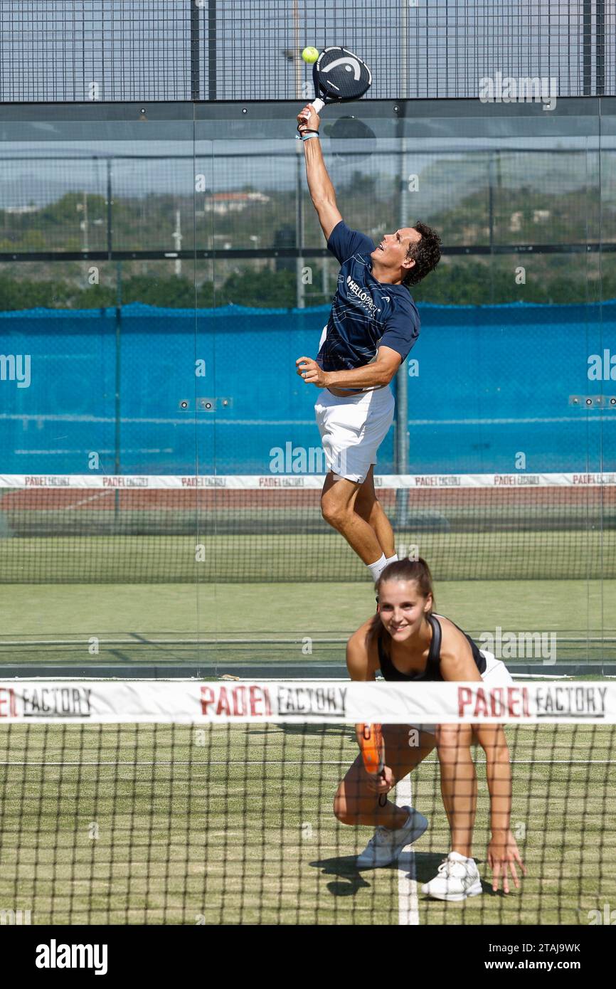 Young couple playing padel tennis. Stock Photo