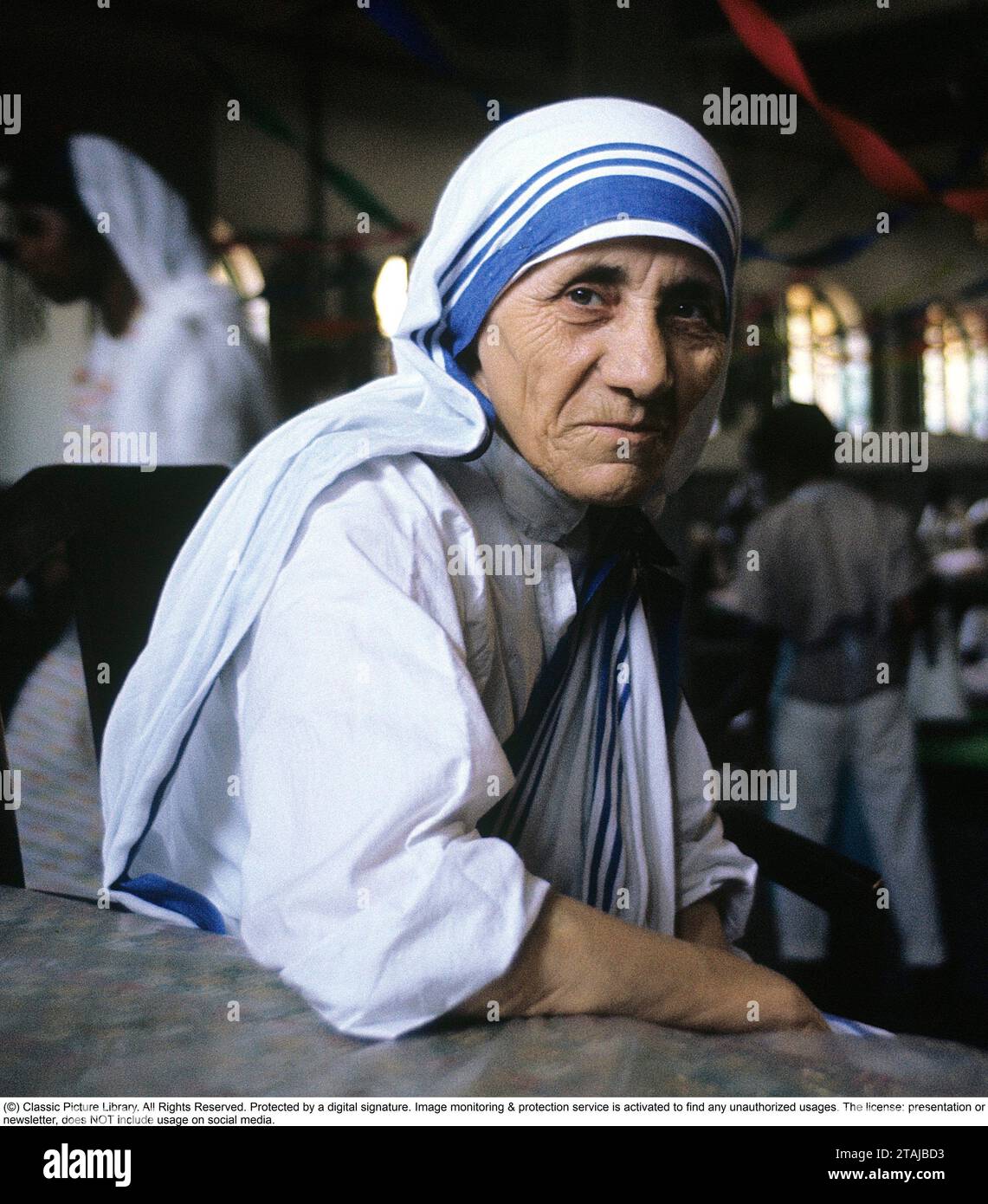 Mary Teresa Bojaxhiu  26 August 1910 – 5 September 1997), better known as Mother Teresa, was an Albanian-Indian Catholic nun and the founder of the Missionaries of Charity. Born in Skopje, then part of the Ottoman Empire, at the age of 18 she moved to Ireland and later to India, where she lived most of her life. On 4 September 2016, she was canonised by the Catholic Church as Saint Teresa of Calcutta.1963.  Roland Palm ref 8-5-2 Stock Photo