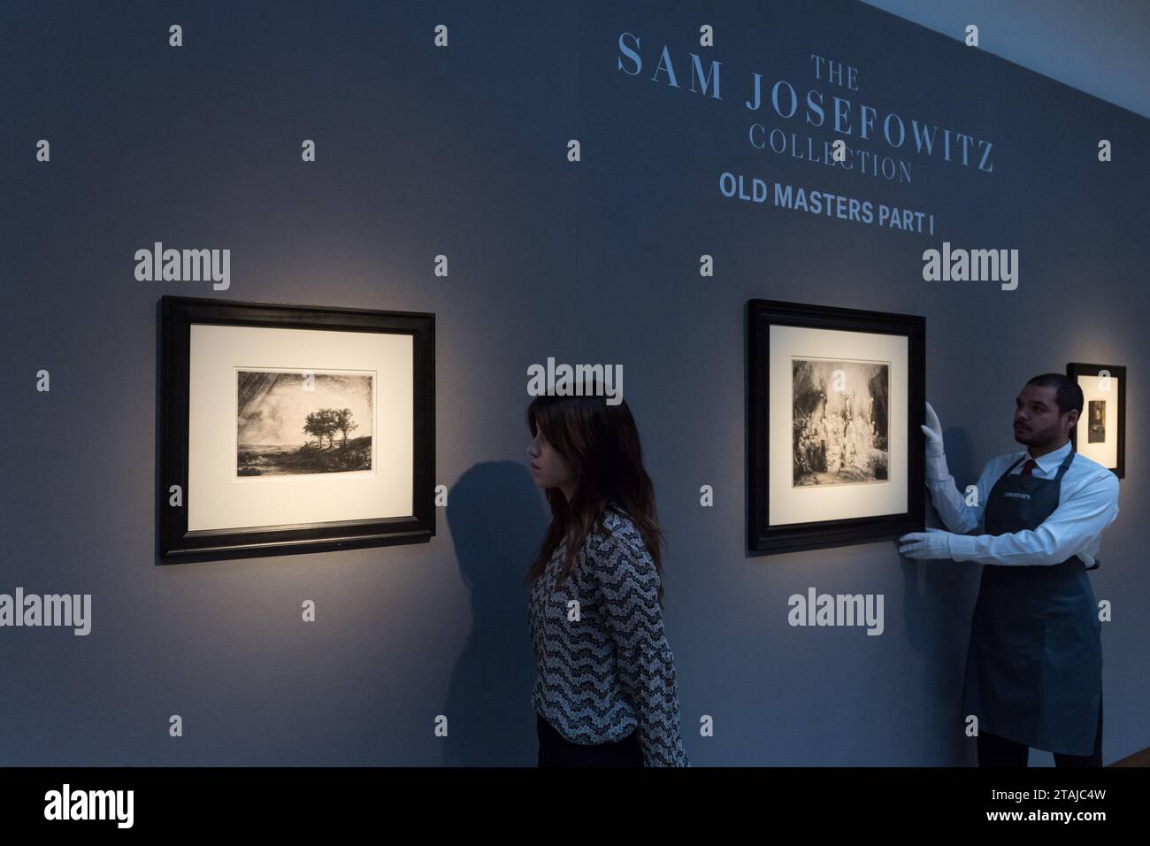 London, UK. 01st Dec, 2023. LONDON, UNITED KINGDOM - DECEMBER 01, 2023: A gallery staff member looks at a print by Rembrandt, The Three Trees, (1643) estimate: £300,000-500,000 during a photocall at Christie's auction house showcasing the highlights from the Classic Week Sales in London, United Kingdom on December 01, 2023. Spanning art from antiquity to the 21st century, with six live auctions and one online sale, the Classic Week Sales series will run from 1 to 15 December. (Photo by WIktor Szymanowicz/NurPhoto) Credit: NurPhoto SRL/Alamy Live News Stock Photo