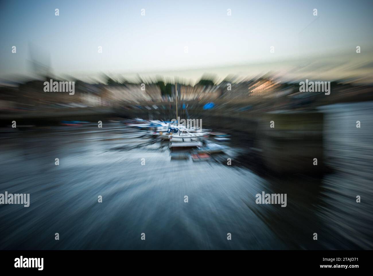 creative zoomed in shot of a harbour at low tide, sense of motion Stock Photo