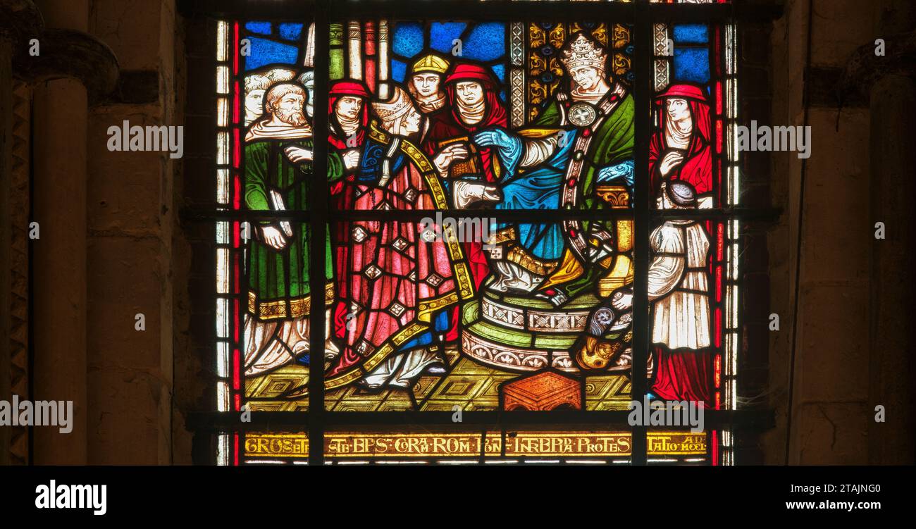 Bishop Grosseteste of Lincoln cathedral, England, talks to Pope Innocent IV in 1250: stained glass window in the chapter house of the cathedral. Stock Photo