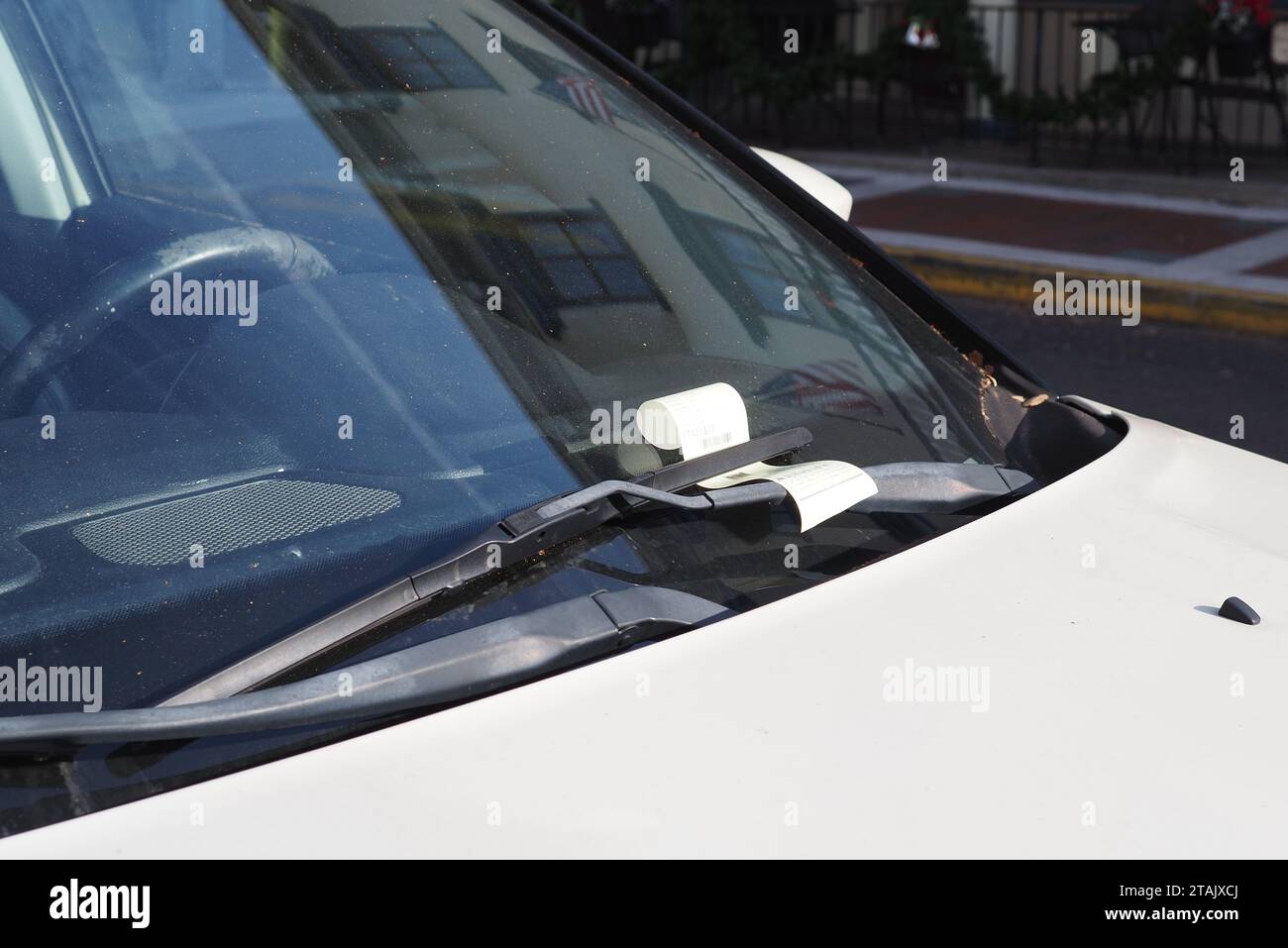 Oops, thos car received a parking ticket. Stock Photo