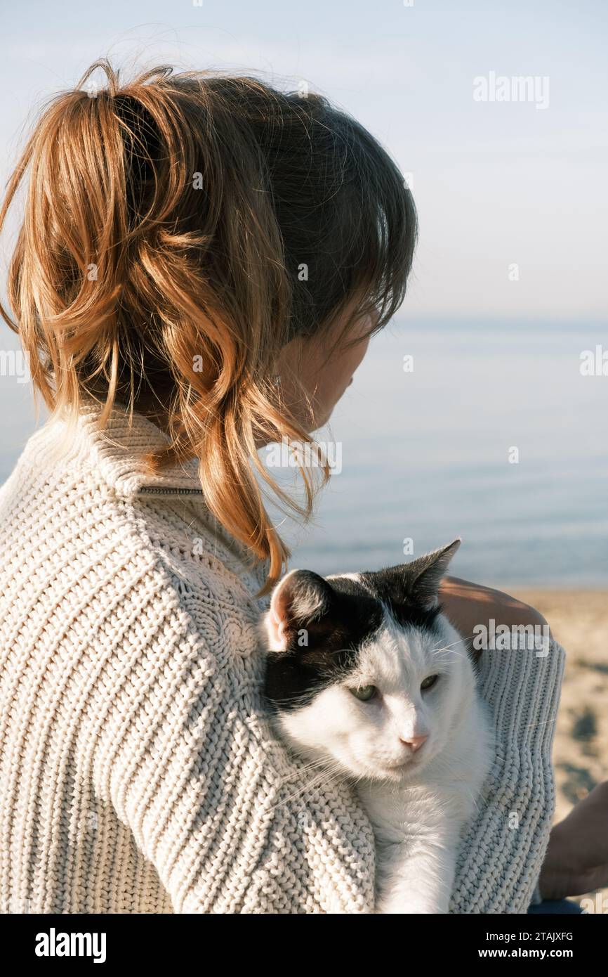 Onner Friend Pet owner and her feline friend Stock Photo - Alamy