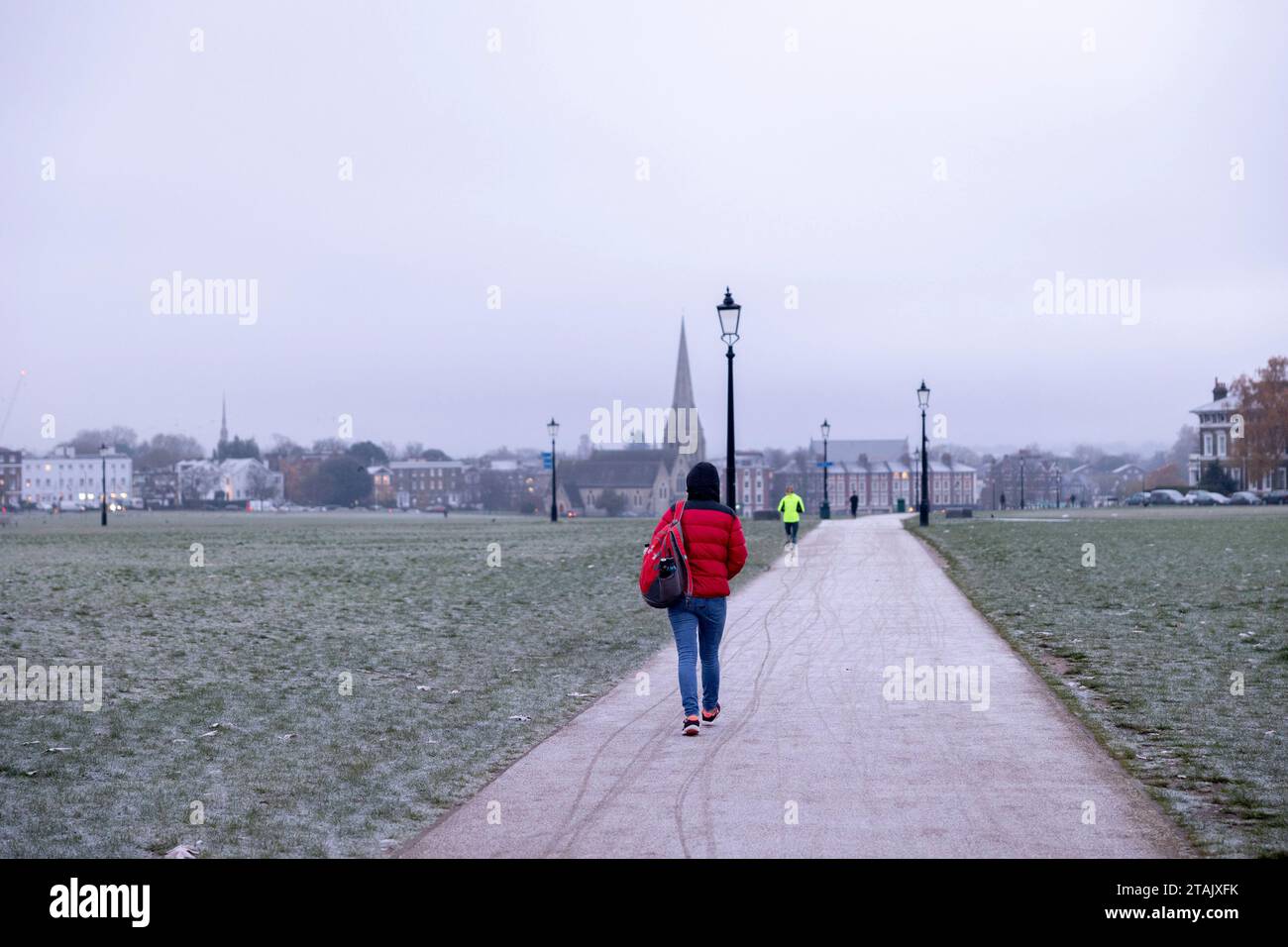 London, UK. 01st Dec, 2023. A person seen walking in the freezing early