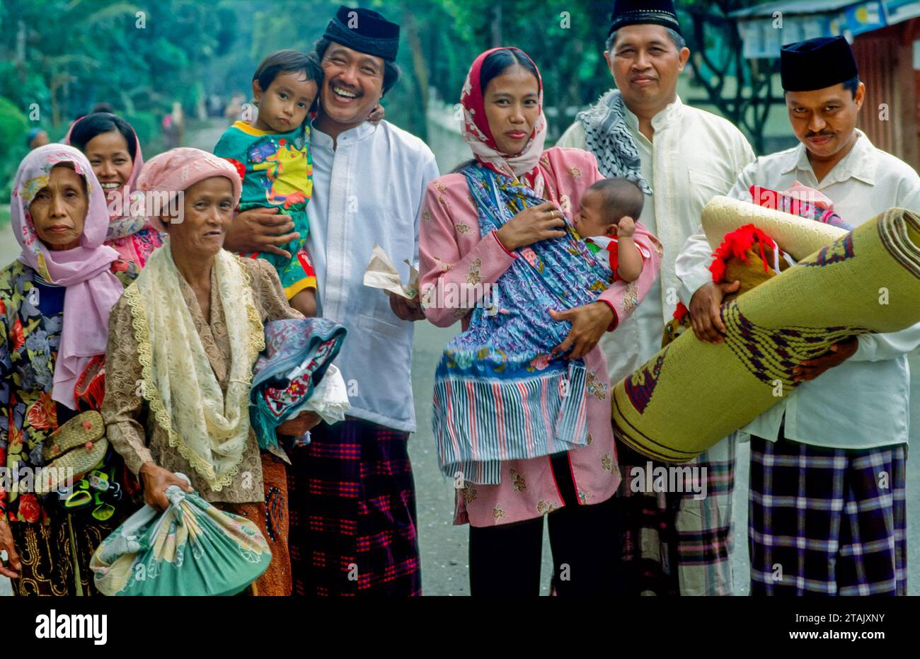 Indonesia, Yogyakarta. Family on their way to celebrate Idul Fitri (Eid) at the end of Ramadan. Stock Photo