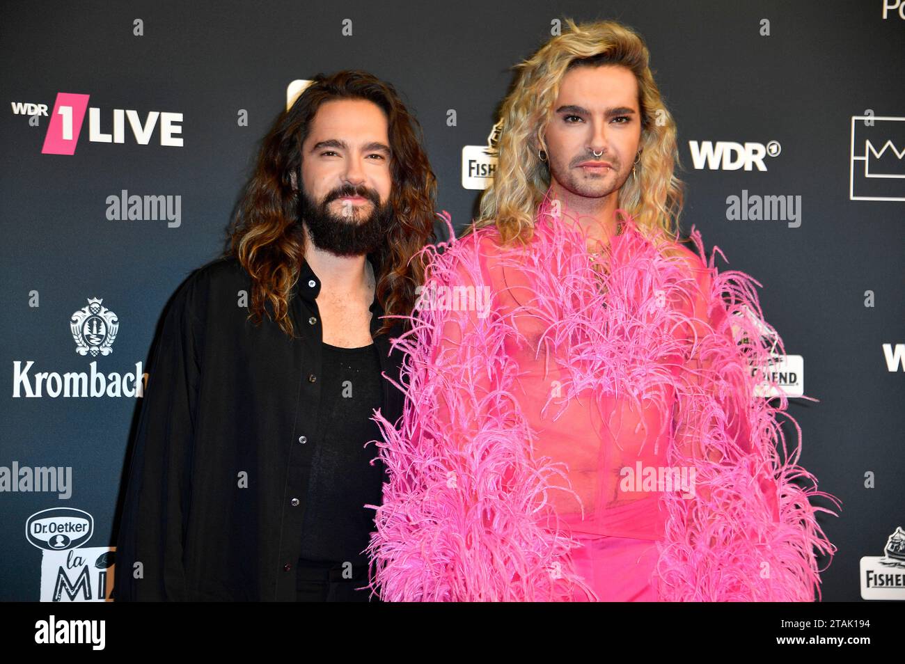 Tom Kaulitz und Bill Kaulitz von Tokio Hotel bei der 24. Verleihung der 1Live Krone 2023 im Lokschuppen. Bielefeld, 30.11.2023 Stock Photo