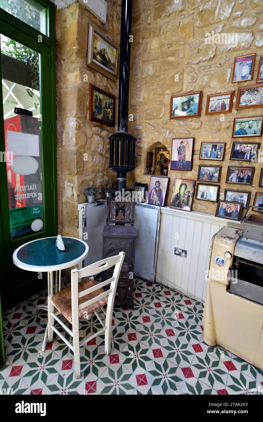 Lefkosia, Cyprus - September 30, 2023: interior with old oven and pictures in a coffee shop on the green line Stock Photo
