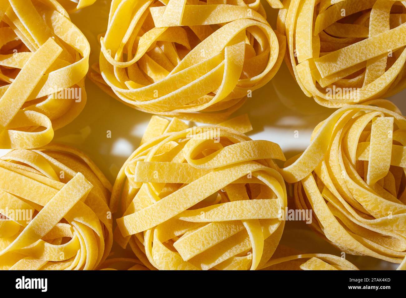 Uncooked Egg-Based Fettuccine Pasta: A Culinary Canvas of Ribbon-Shaped ...