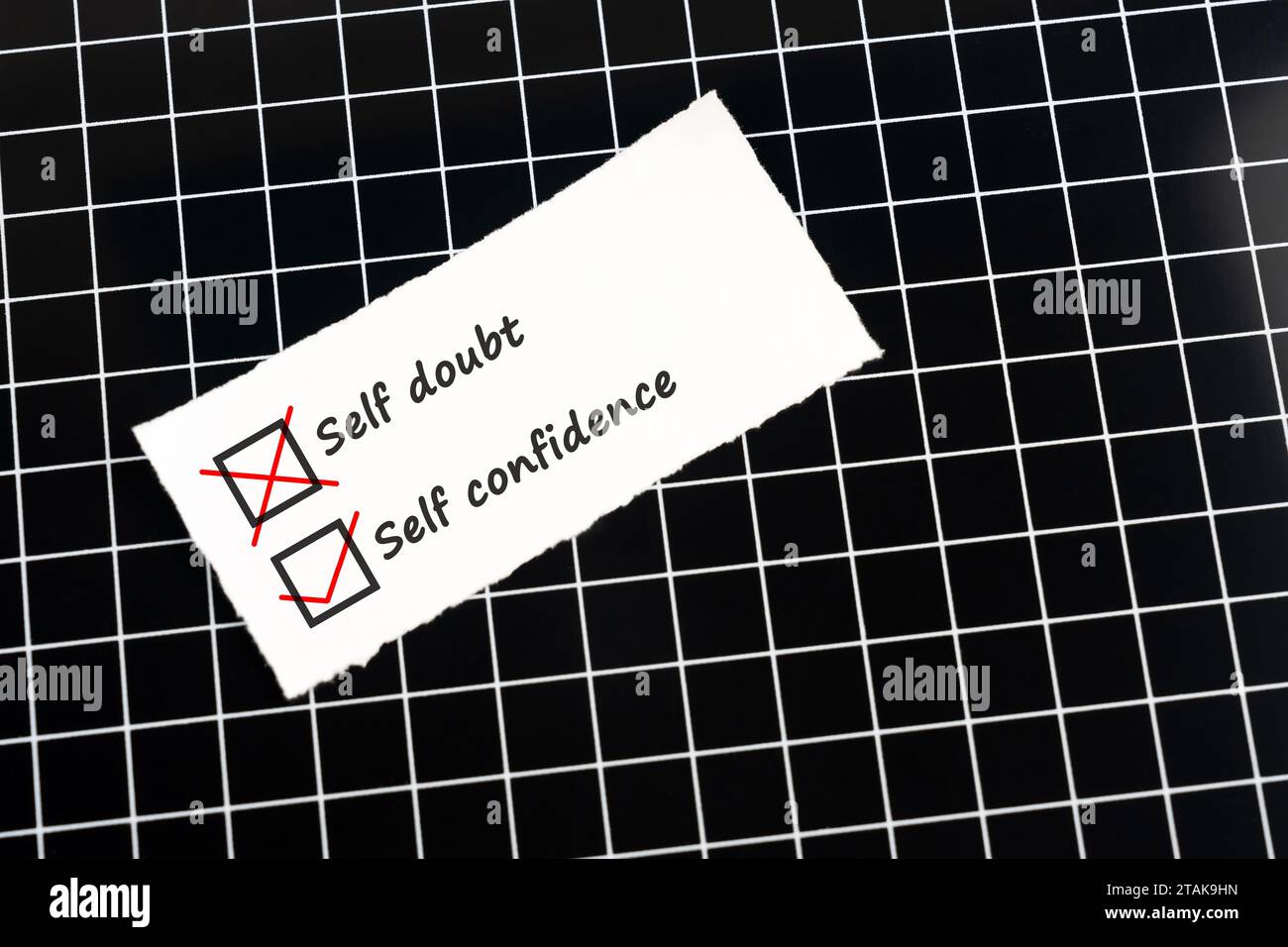 Self Doubt and Self Confidence text on paper Stock Photo