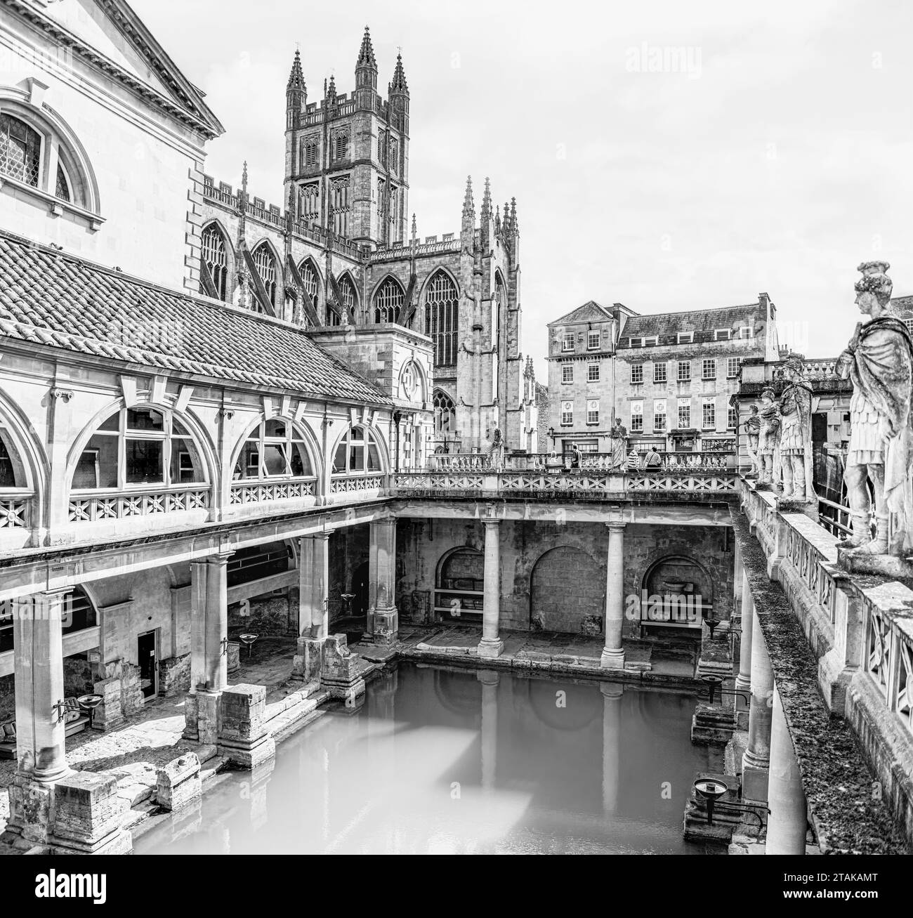 The Roman Baths complex, a site of historical interest in the English city of Bath, Somerset, England in black and white Stock Photo