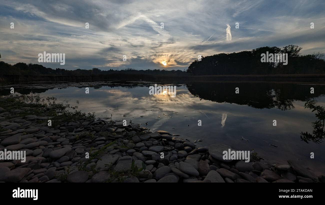 Fall sunset over a rocky beach in Rattray Marsh Southern Ontario Stock Photo