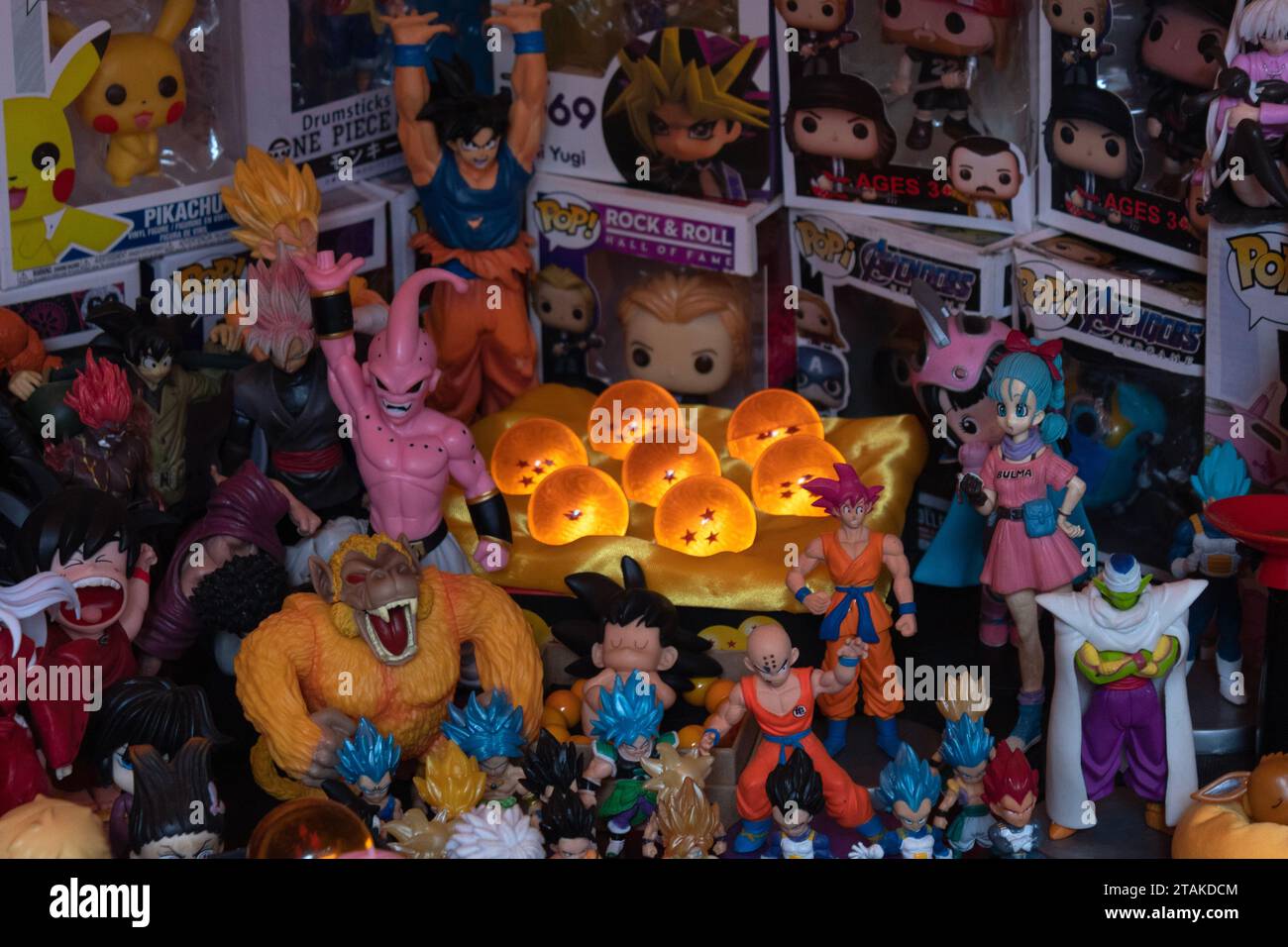 Closeup to a 7th crystal drangon balls of the anime series dragon ball with character toys at flea market store Stock Photo