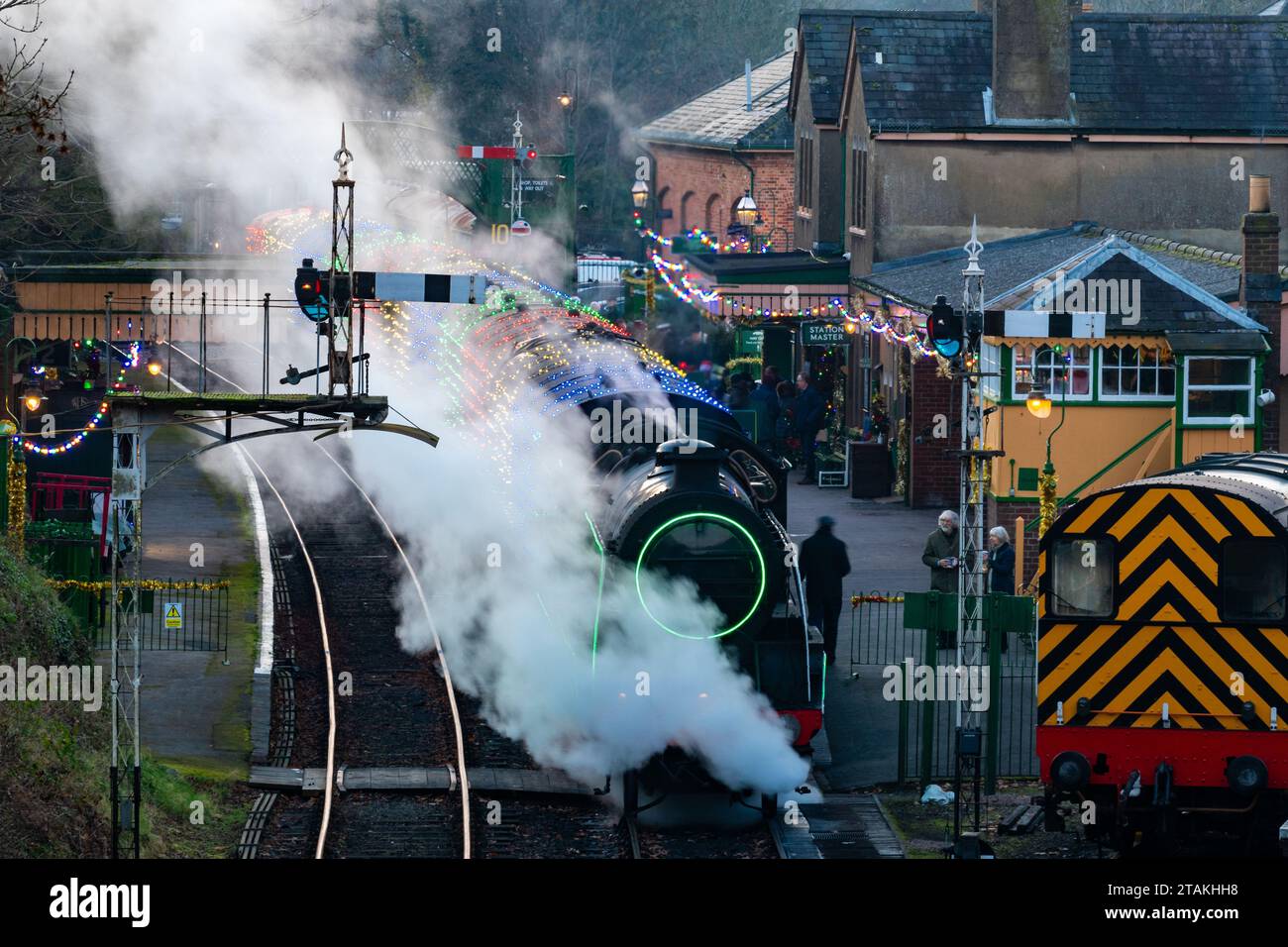 1st December 2023. Steam train illuminations Christmas event on the Watercress Line, Alresford Station, Hampshire, England, UK. The popular annual event gives people the chance to ride on an illuminated vintage steam train, lit up with colourful Christmas lights. Stock Photo