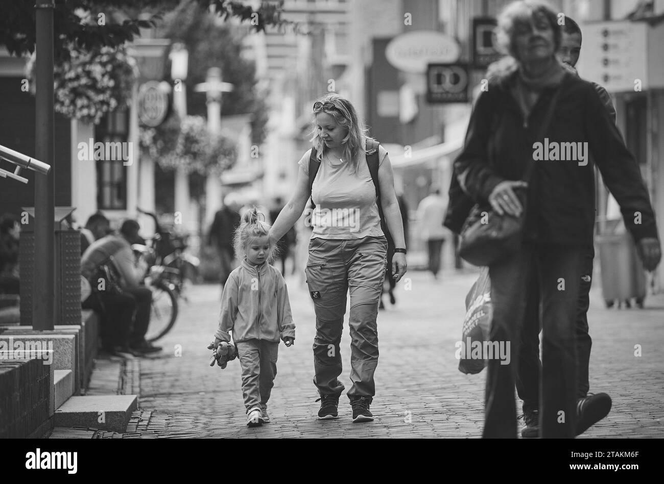 Zaandam, Netherlands,August 29,2023: Mom and daughter walk in the city Stock Photo