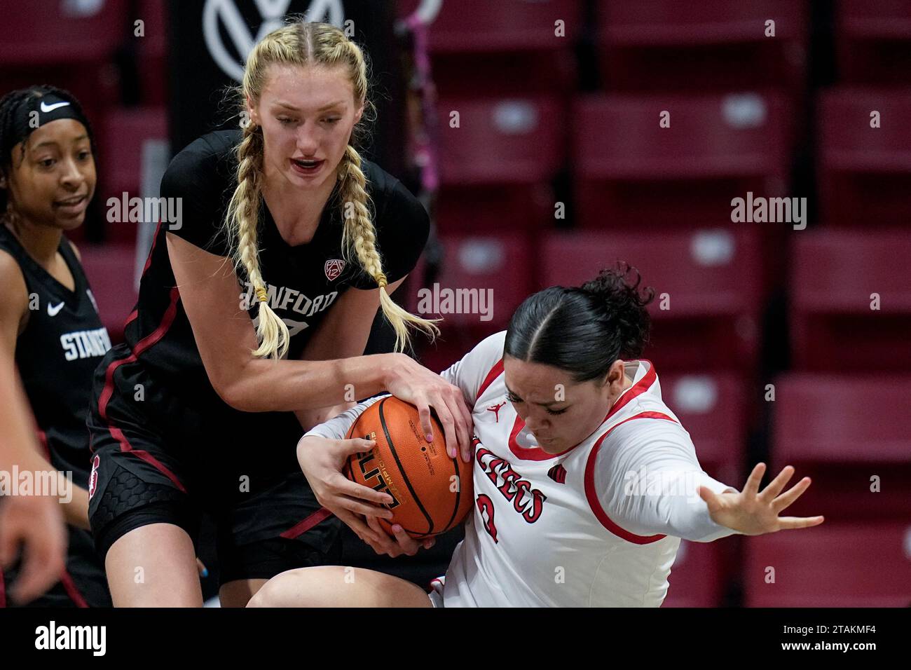 Stanford forward Cameron Brink, left, battles San Diego State guard