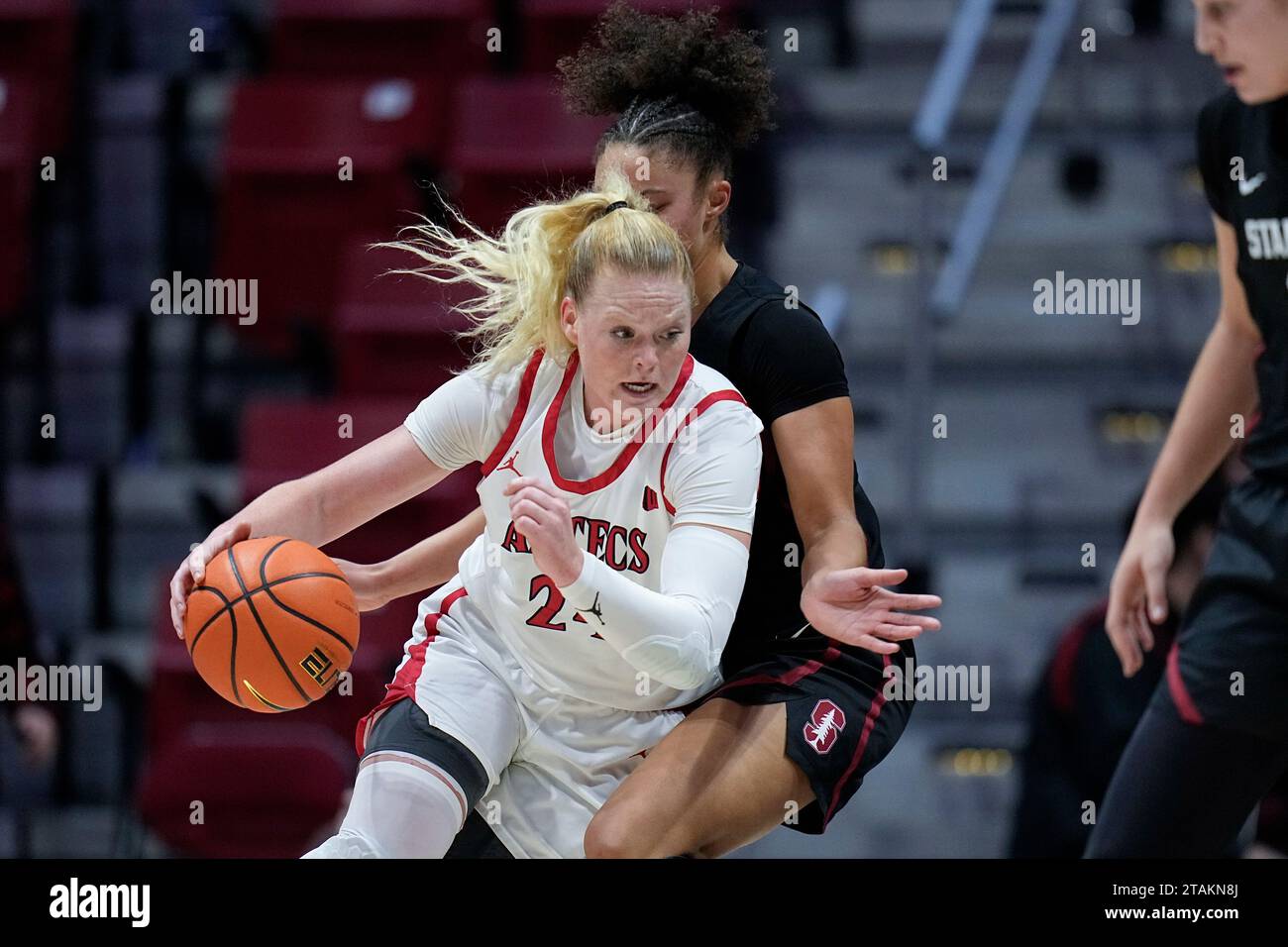 San Diego State guard Abby Prohaska, front, drives towards the basket
