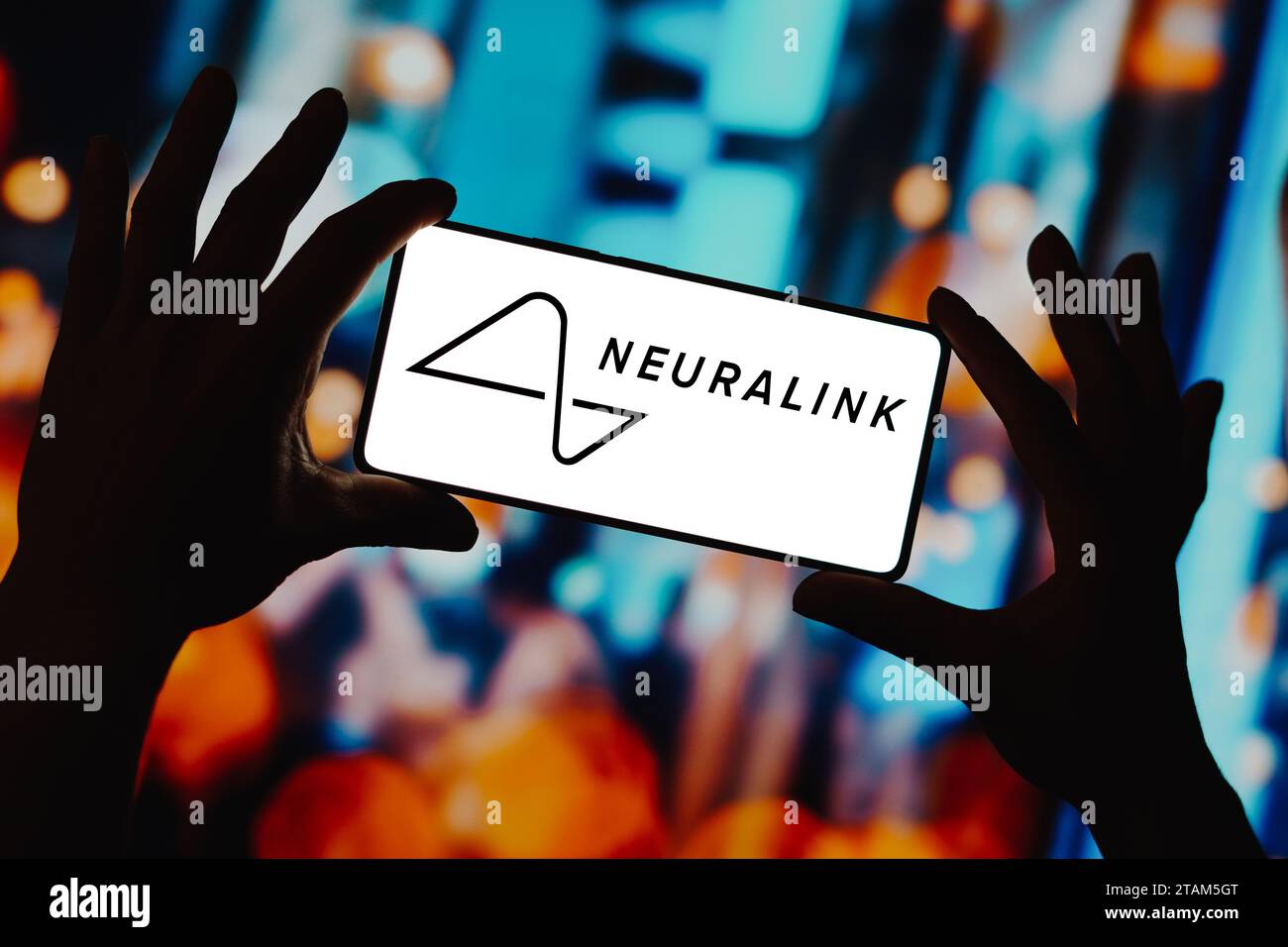 In this photo illustration, the Neuralink logo is displayed on a smartphone screen. Stock Photo