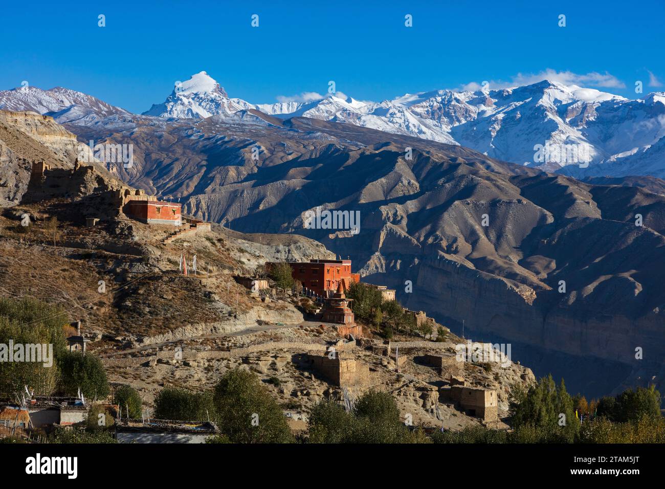 In Gheling the Thrangu Tashi Choling Monastery dates back to the 15th century - Mustang District, Nepal Stock Photo