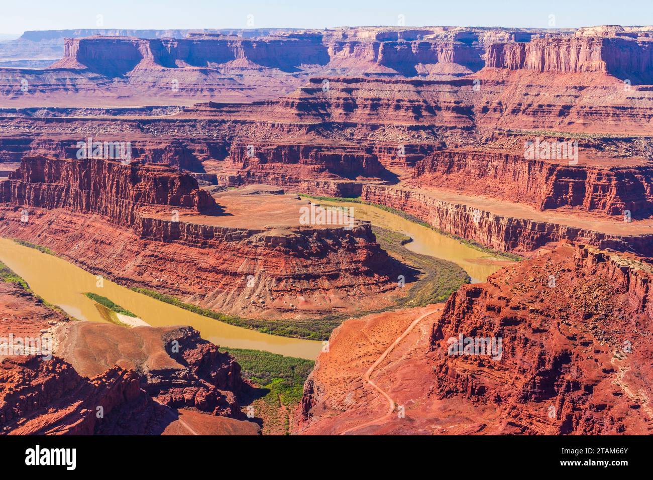 Dead Horse Point State Park in Utah overlooks the Colorado 2000 feet below with its carved canyon and amazing geologic formations and the pinnacles. Stock Photo
