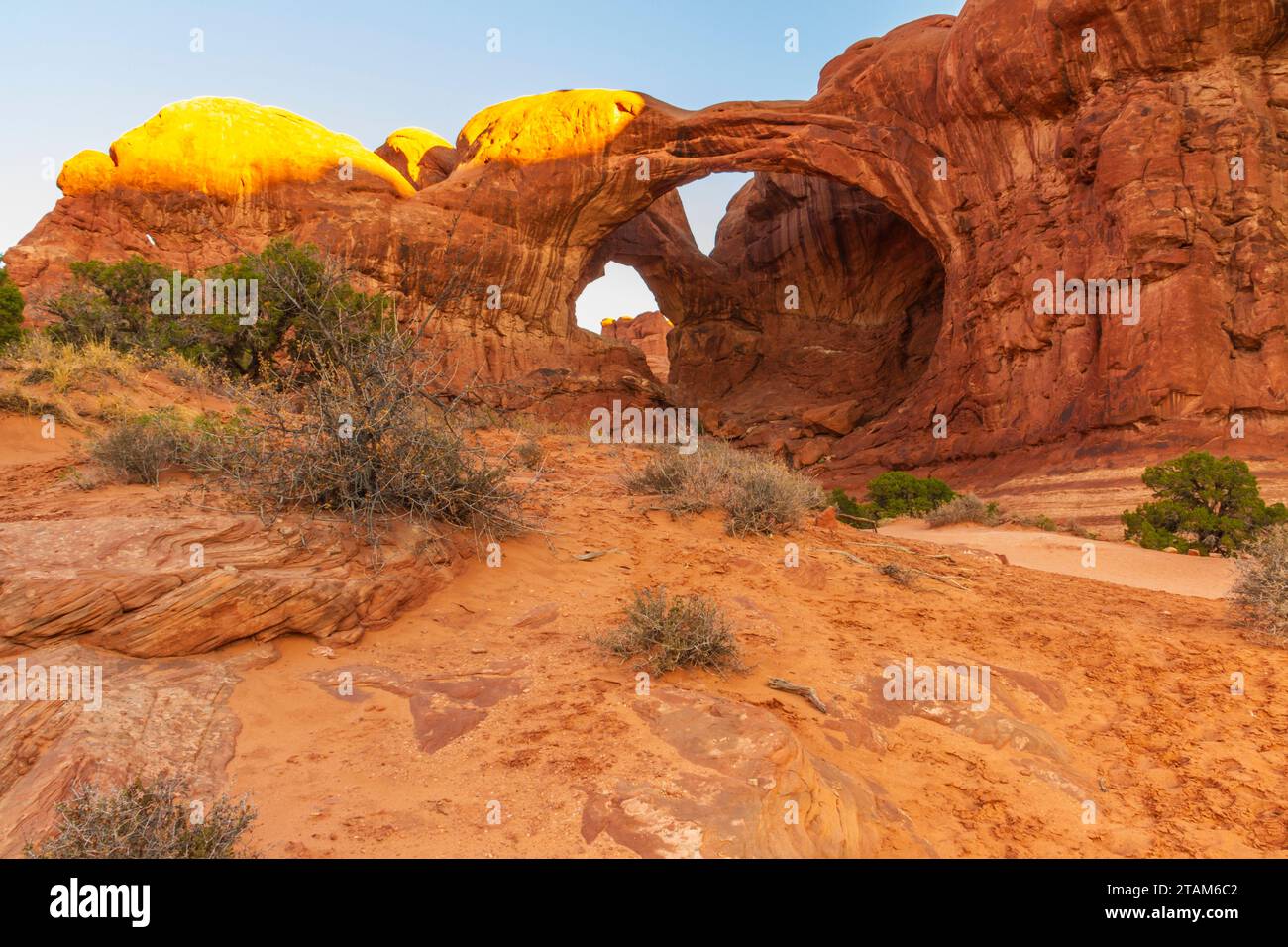 Double Arch at Sunrise in Arches National Park in Utah. Stock Photo