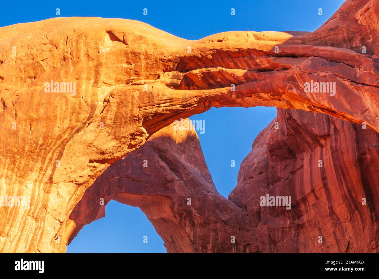 Double Arch at Sunrise in Arches National Park in Utah. Stock Photo