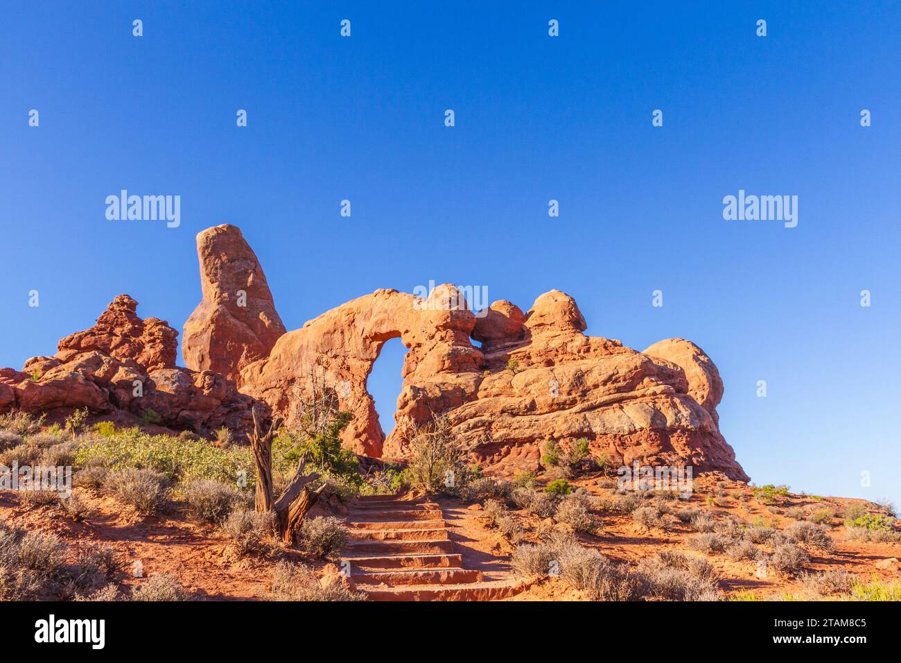 Early morning light on Turret Arch in Arches National Park in Utah. Stock Photo