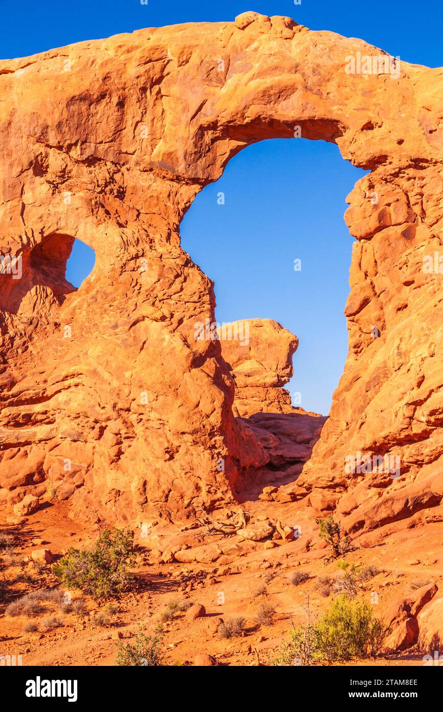Early morning light on Turret Arch in Arches National Park in Utah. Stock Photo