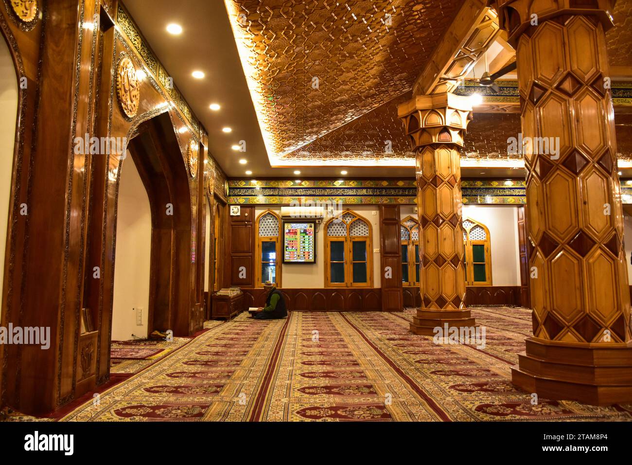 Srinagar, India. 01st Dec, 2023. A man recites the Holy Quran inside the Masjid or Mosque during a cold evening in Srinagar, the summer capital of Jammu and Kashmir. (Photo by Saqib Majeed/SOPA Images/Sipa USA) Credit: Sipa USA/Alamy Live News Stock Photo