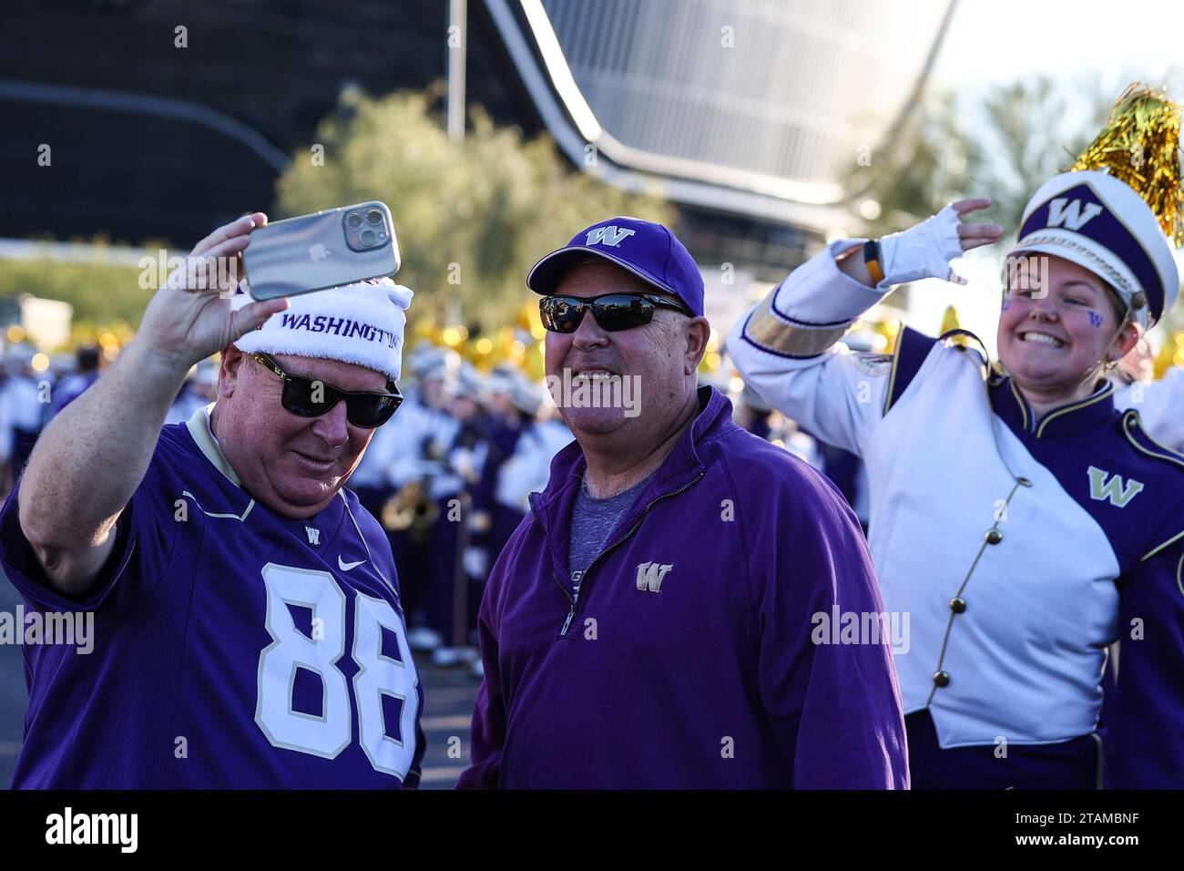 december-01-2023-washington-huskies-fans-pose-for-a-selfie-prior-to