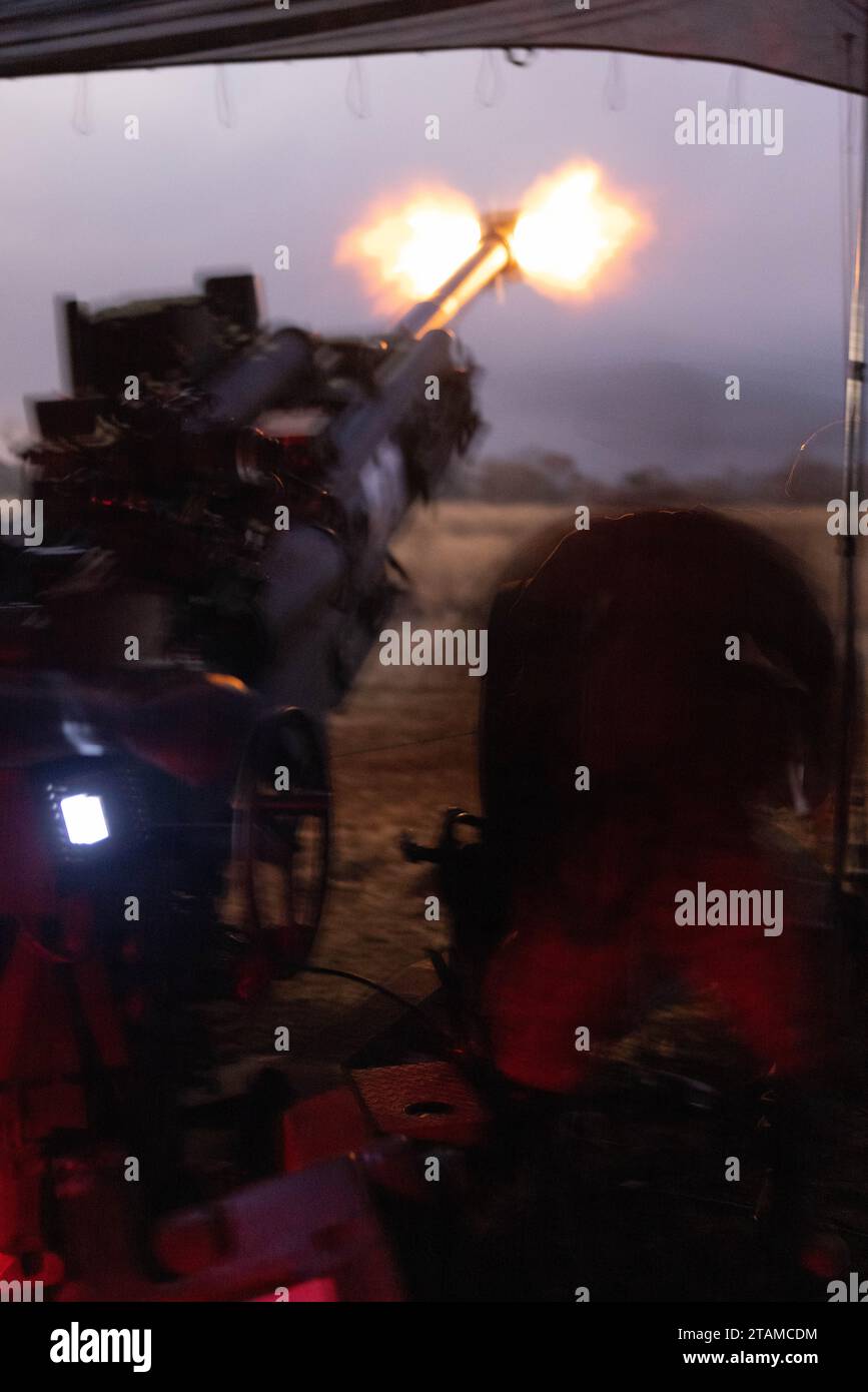 U.S. Marine Corps Cpl. Freeman Diah fires an M777 Howitzer during ...