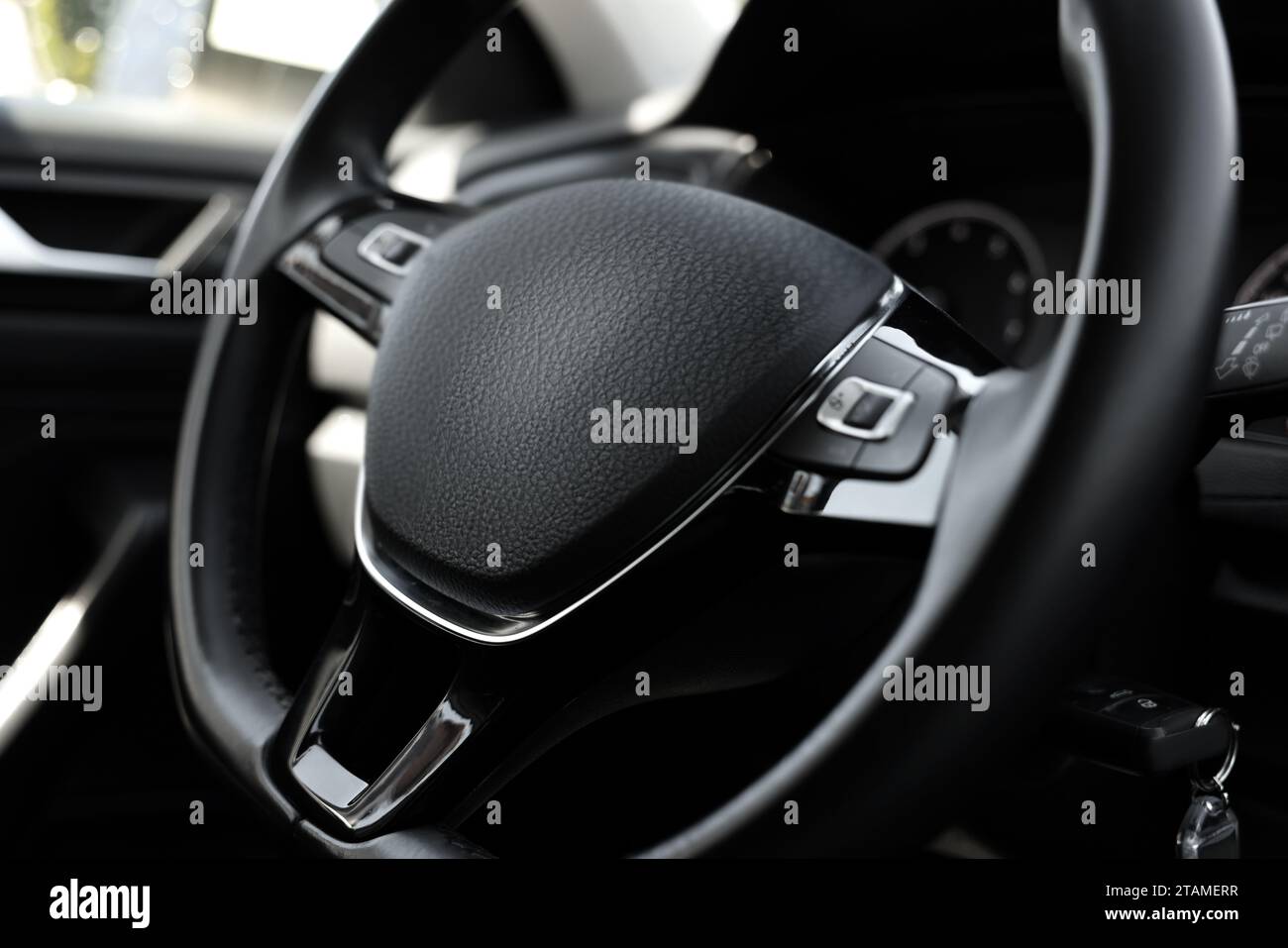 Safety airbag sign on steering wheel inside car Stock Photo